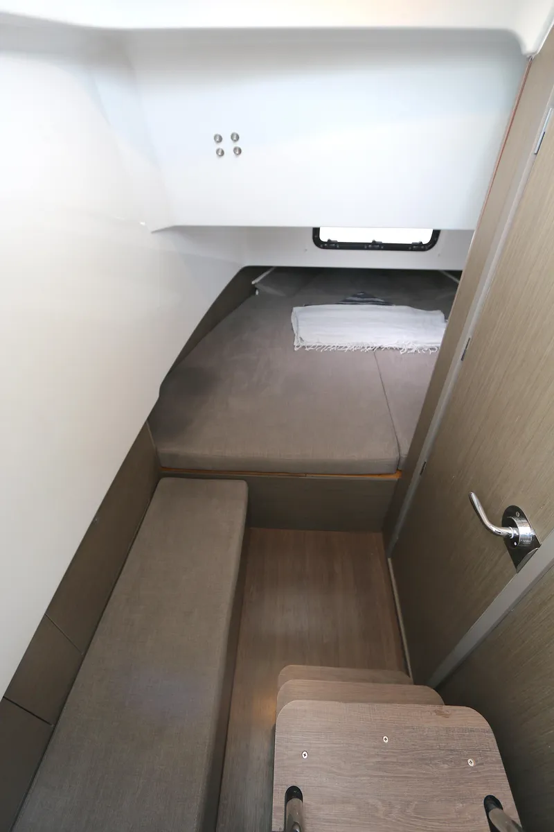 Slide: The Image of Interior cabin of 2022 Beneteau FLYER 9 SPACE DECK boat, featuring modern design and compact layout. - 4