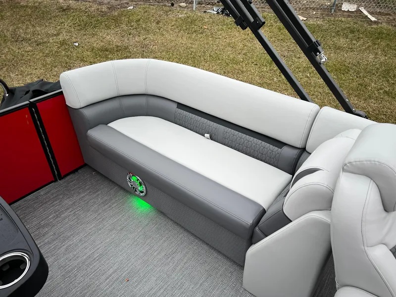 Slide: The Image of 2024 Godfrey SWEETWATER 2286 SB pontoon boat interior with gray and white seating. - 13