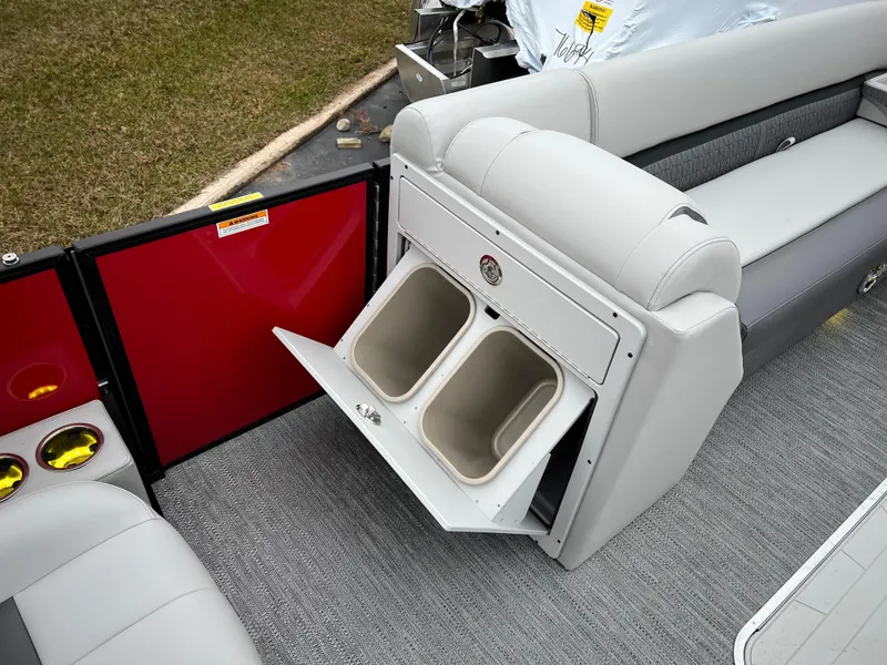 Slide: The Image of 2024 Godfrey SWEETWATER 2286 SB pontoon boat with open storage compartments. - 16