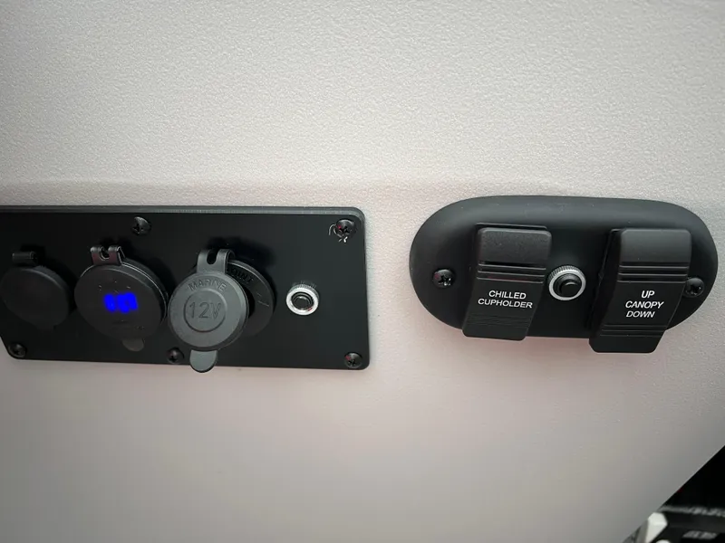 Slide: The Image of Control panel of 2024 Godfrey SWEETWATER 2286 SB with switches and ports. - 22