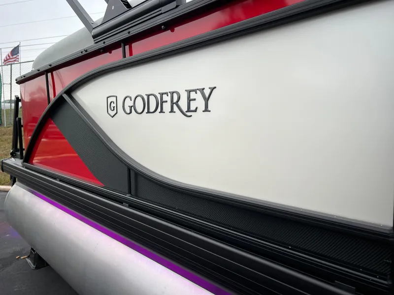 Slide: The Image of 2024 Godfrey SWEETWATER 2286 SB pontoon boat side view with logo. - 5