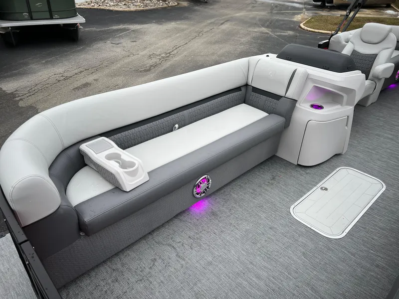 Slide: The Image of 2024 Godfrey SWEETWATER 2286 SB pontoon boat interior with gray seating and cup holders. - 9