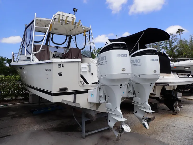 Slide: The Image of 1989 Blackfin 29 Combi boat with twin Suzuki 300 outboard engines. - 0