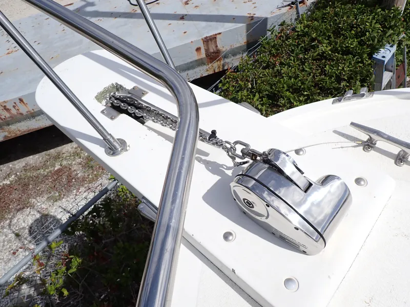 Slide: The Image of 1989 Blackfin 29 Combi boat anchor windlass and chain on deck. - 13