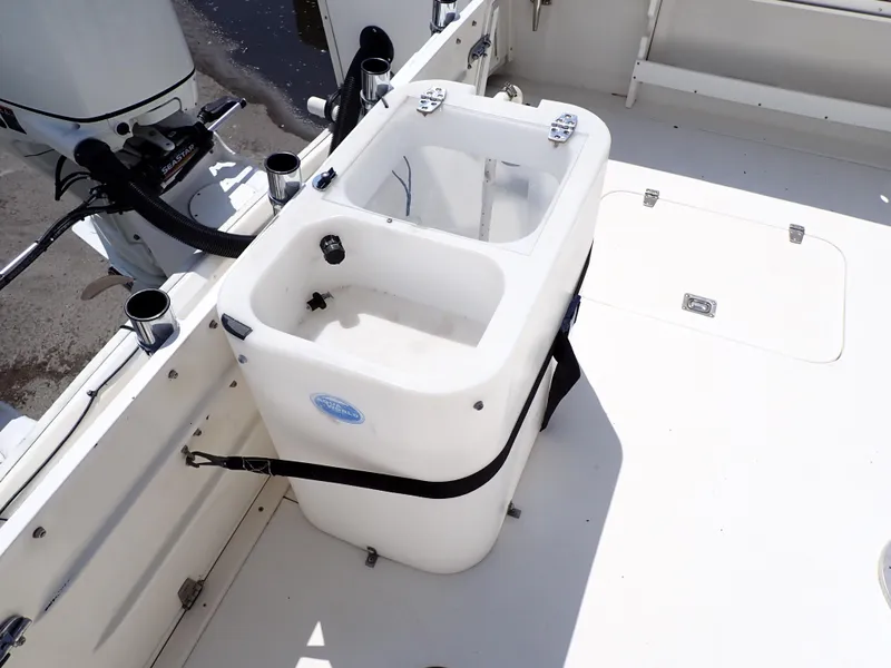 Slide: The Image of 1989 Blackfin 29 Combi boat deck with live bait tank. - 26