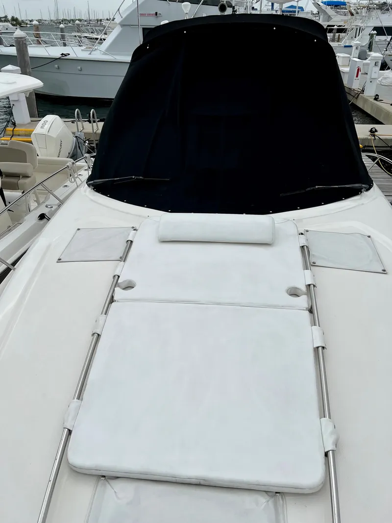 Slide: The Image of 2007 Sea Ray 320 Sundancer repowered yacht with sunpad at marina. - 14