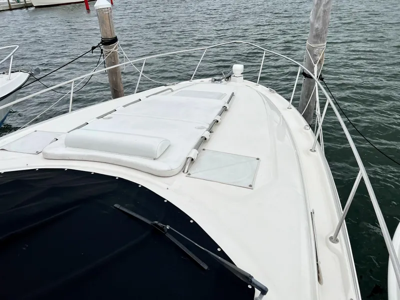 Slide: The Image of 2007 Sea Ray 320 Sundancer repowered, docked, bow view. - 15