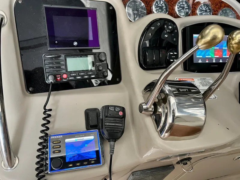 Slide: The Image of Control panel of a 2007 Sea Ray 320 Sundancer repowered boat. - 18