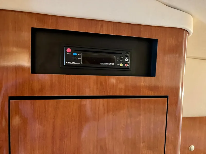 Slide: The Image of Built-in entertainment system on 2007 Sea Ray 320 Sundancer yacht. - 26