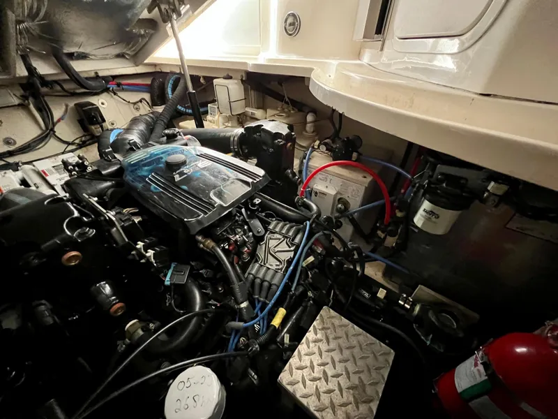 Slide: The Image of Engine room of a 2007 Sea Ray 320 Sundancer repowered boat. - 30