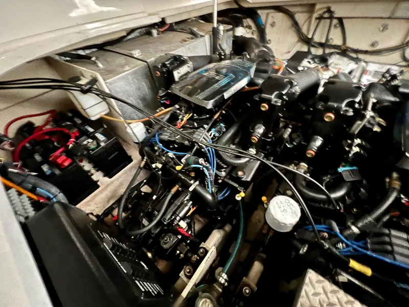 Slide: The Image of Engine compartment of a 2007 Sea Ray 320 Sundancer repowered boat. - 31