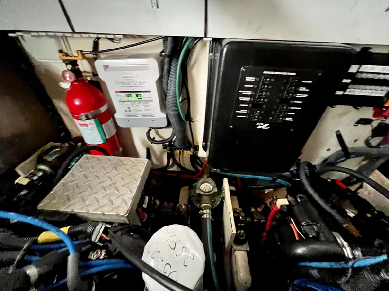 Slide: The Image of Engine compartment of a 2007 Sea Ray 320 Sundancer repowered boat. - 32