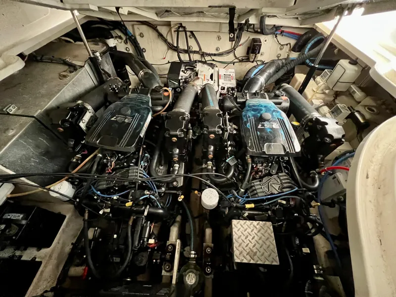 Slide: The Image of Engine compartment of a 2007 Sea Ray 320 Sundancer repowered boat. - 33