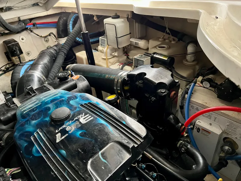 Slide: The Image of Engine compartment of a 2007 Sea Ray 320 Sundancer repowered boat. - 34