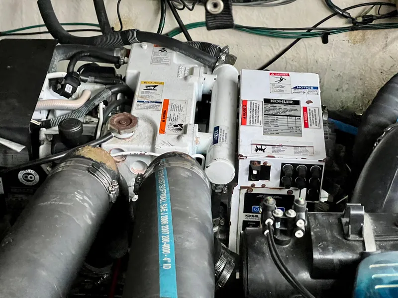 Slide: The Image of Engine compartment of a 2007 Sea Ray 320 Sundancer repowered boat. - 35