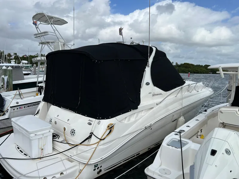 Slide: The Image of 2007 Sea Ray 320 Sundancer repowered docked at marina. - 36