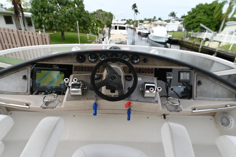 Slide: The Image of Helm of 2005 Carver 36 Super Sport yacht with navigation equipment. - 6