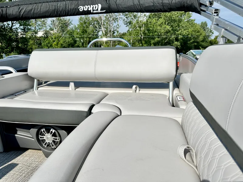 Slide: The Image of 2023 Tahoe Pontoon 23FT Cascade Versatile Rear Bench, luxurious seating, outdoor setting. - 13