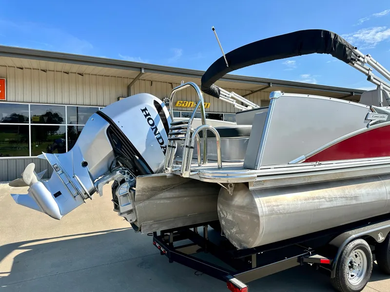 Slide: The Image of 2023 Tahoe Pontoon 23FT Cascade Versatile Rear Bench with Honda outboard motor. - 4