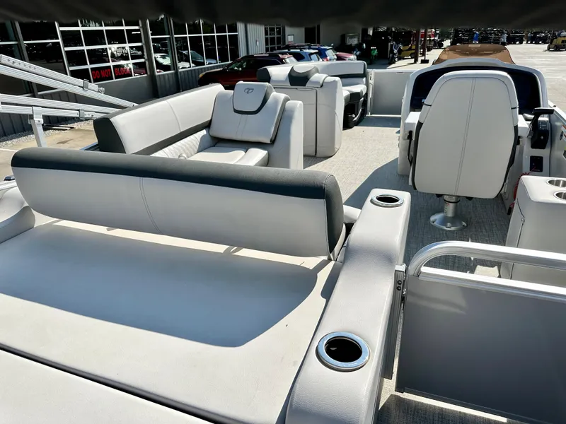 Slide: The Image of 2023 Tahoe Pontoon 23FT Cascade Versatile Rear Bench interior with luxurious seating. - 9