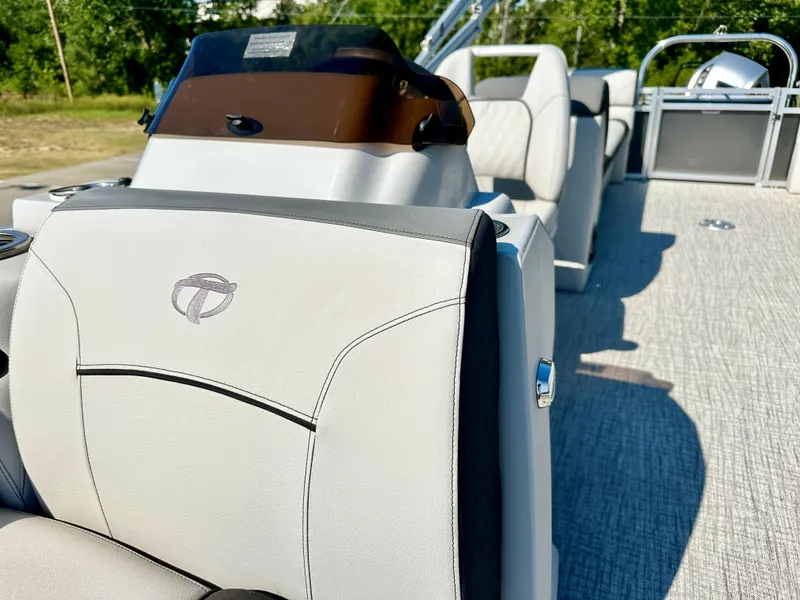 Slide: The Image of 2023 Tahoe Pontoon 25 FT LTZ Quad Lounger interior with luxurious seating. - 3