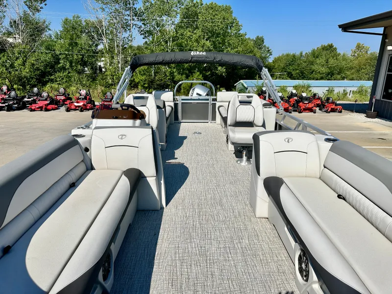 Slide: The Image of 2023 Tahoe Pontoon 25 FT LTZ Quad Lounger with spacious seating and modern design. - 4