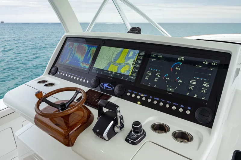 Slide: The Image of 2025 Valhalla Boatworks V-55 helm with advanced navigation and control systems. - 9