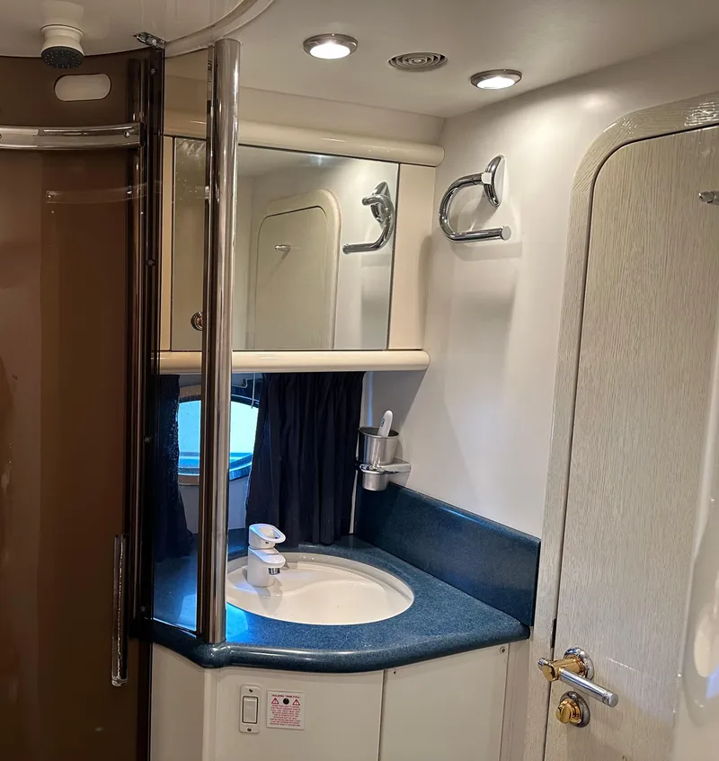 Slide: The Image of Bathroom interior of 1997 Sunseeker Camargue yacht with sink and mirror. - 11