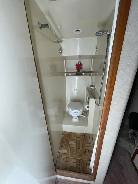 Slide: The Image of 1984 Uniflite Double Cabin bathroom with shower and toilet. - 32