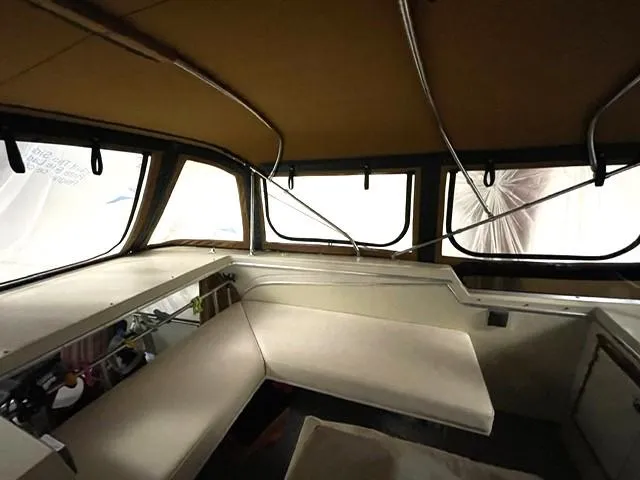 Slide: The Image of 1984 Uniflite Double Cabin interior with seating and windows. - 7
