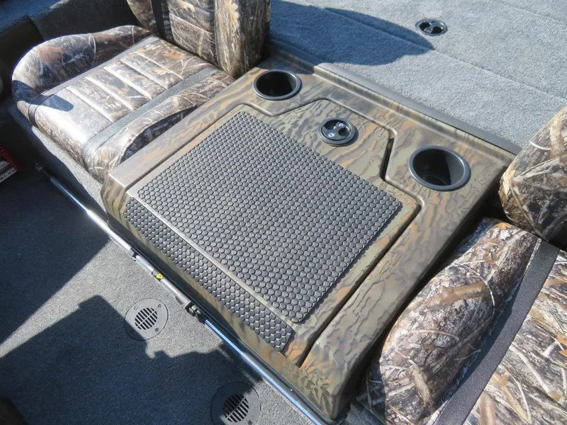 Slide: The Image of 2024 Ranger RT188P boat interior with camo seats and center console. - 11