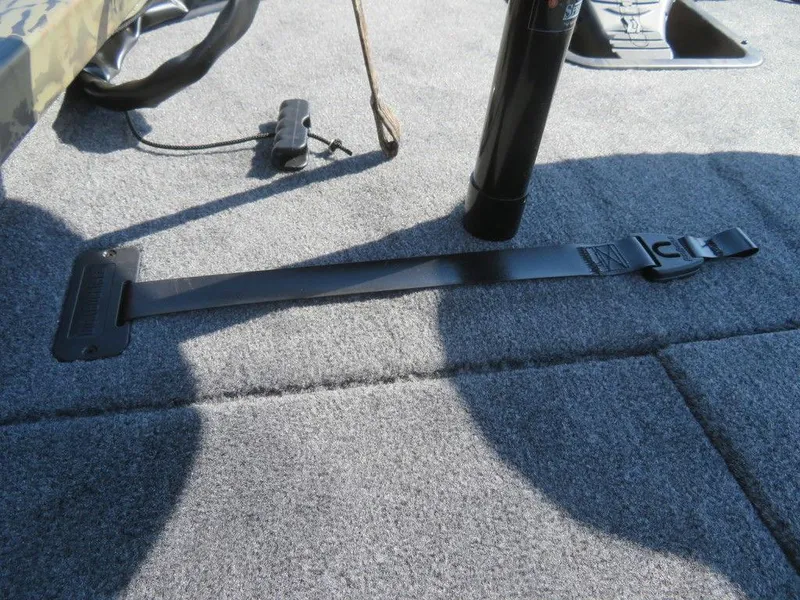 Slide: The Image of 2024 Ranger RT188P boat deck with strap and fishing rod holder. - 21