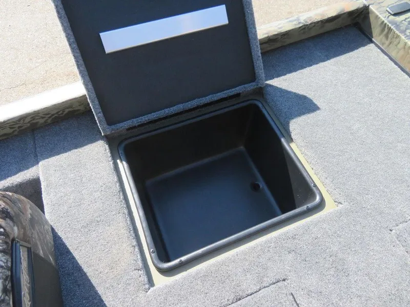 Slide: The Image of 2024 Ranger RT188P storage compartment with open lid. - 23