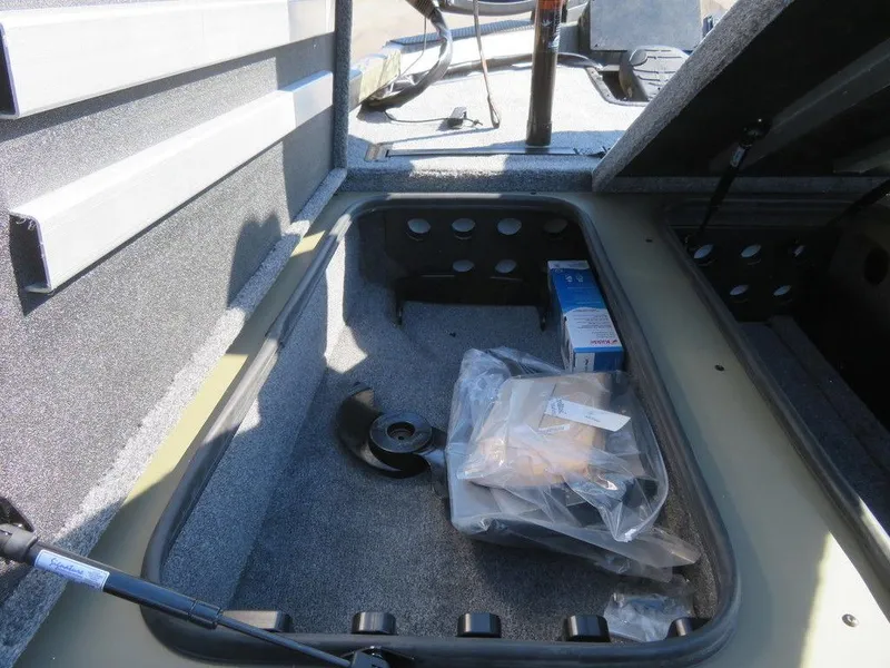 Slide: The Image of 2024 Ranger RT188P storage compartment with equipment and accessories. - 24
