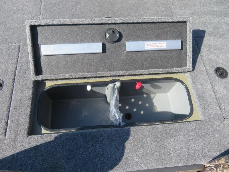 Slide: The Image of 2024 Ranger RT188P boat storage compartment with lid open. - 25