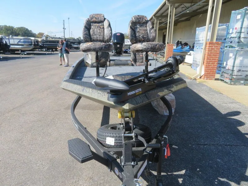 Slide: The Image of 2024 Ranger RT188P fishing boat with camo seats and Minn Kota trolling motor. - 3