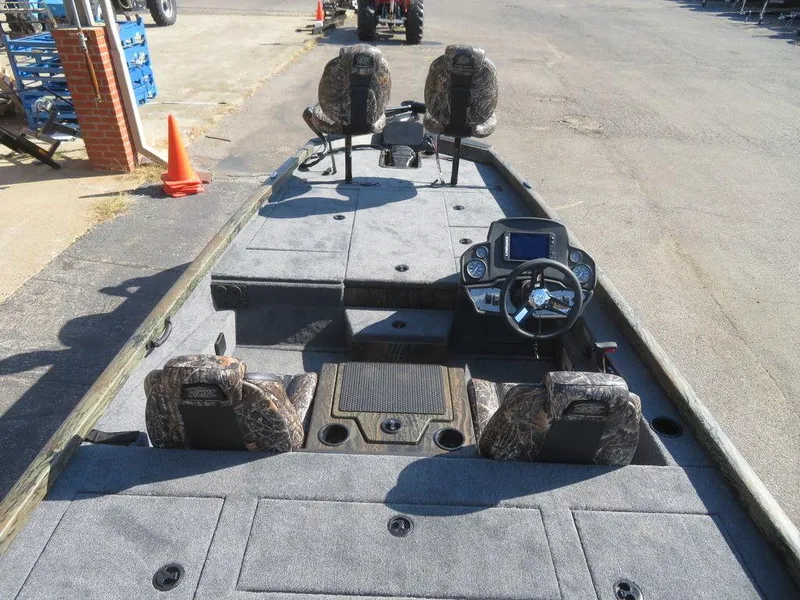 Slide: The Image of 2024 Ranger RT188P fishing boat with camo seats and advanced navigation system. - 8