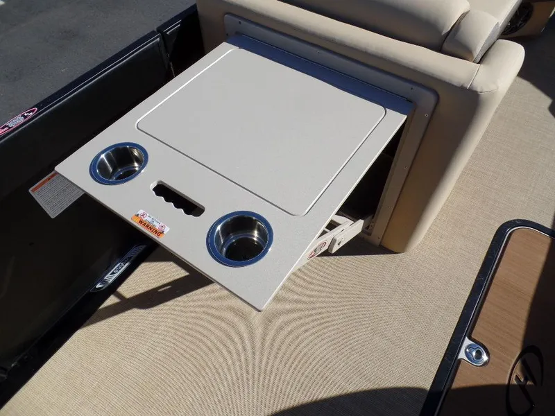 Slide: The Image of Foldable table with cup holders on 2024 Harris Sunliner 230 boat. - 7