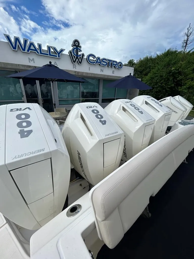 Slide: The Image of 2024 Boston Whaler 405 Conquest with powerful Mercury 400 engines at Wally Castro Marine. - 2