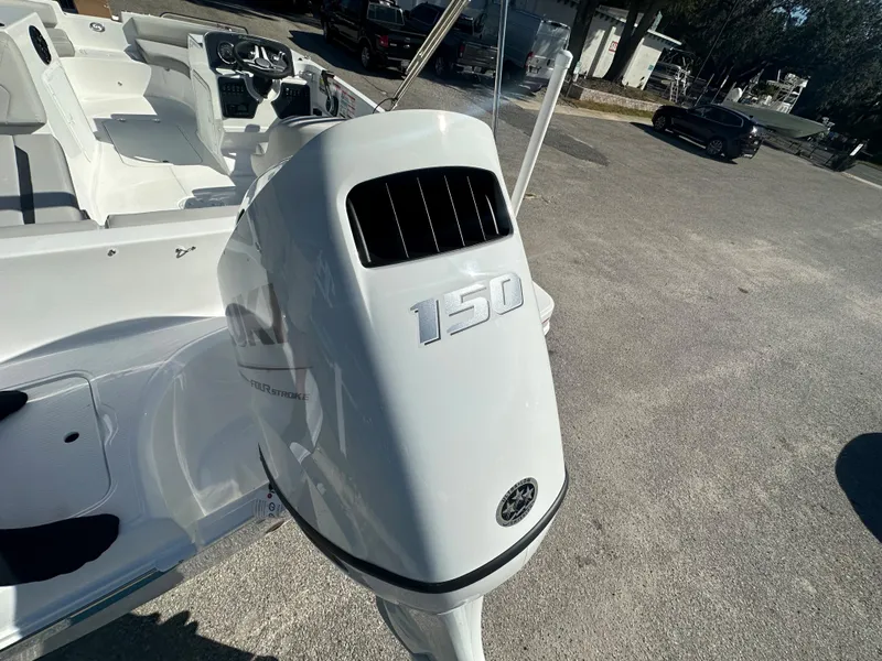 Slide: The Image of 2024 Hurricane SunDeck Sport 188 OB boat with 150 HP outboard motor. - 14