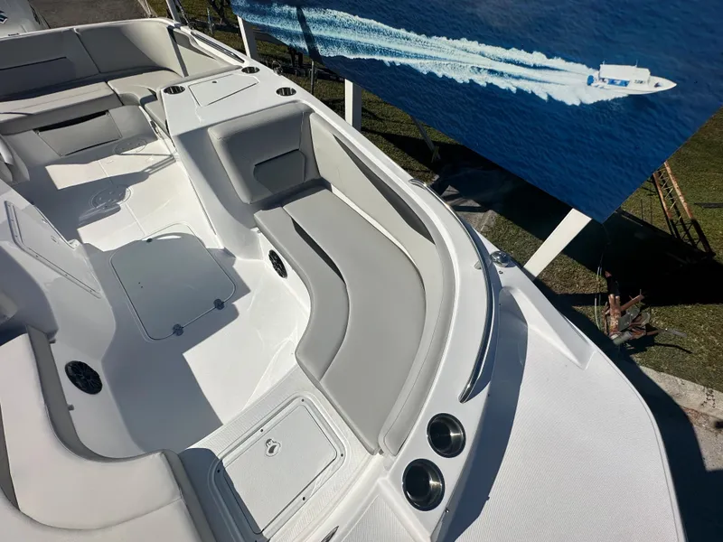 Slide: The Image of 2024 Hurricane SunDeck Sport 188 OB boat interior with seating and storage compartments. - 5