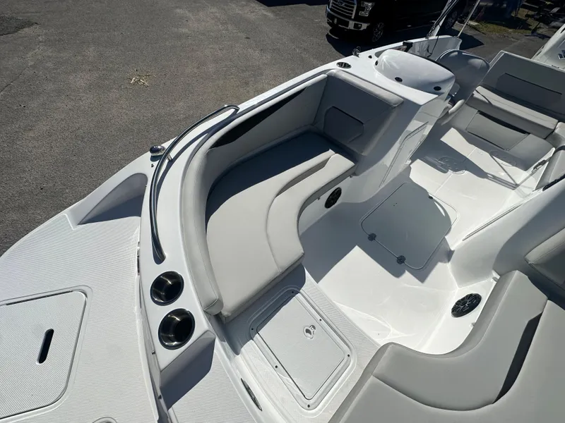 Slide: The Image of 2024 Hurricane SunDeck Sport 188 OB boat interior with seating and storage compartments. - 6