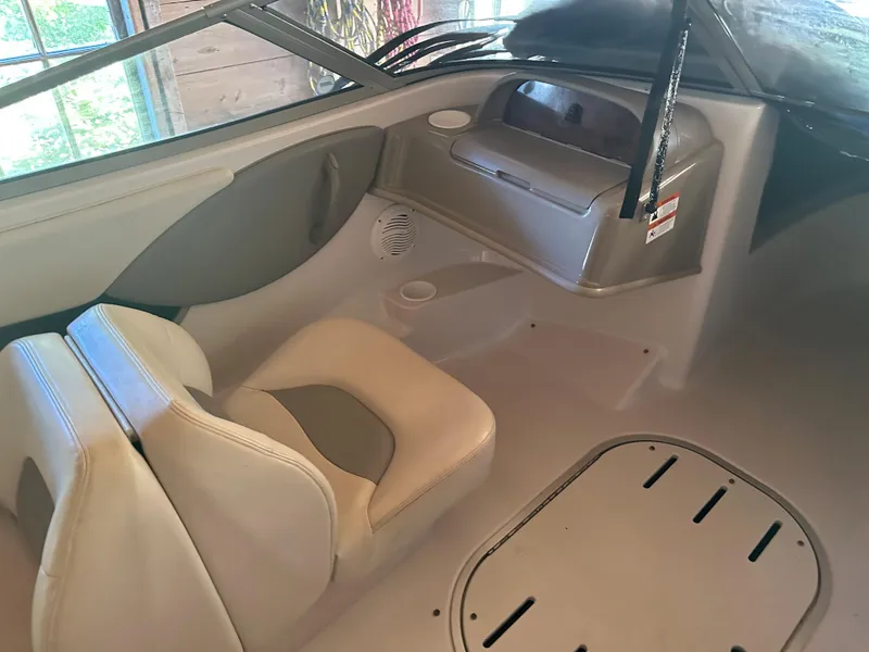 Slide: The Image of Interior of 2003 Four Winns 180 Freedom I/O boat with seating and storage. - 8