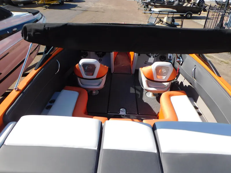 Slide: The Image of 2024 Crownline 240 SS LPX boat interior with orange and white seating. - 5