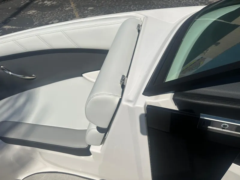 Slide: The Image of 2023 Regal 21 OBX boat interior with white and gray seating. - 15