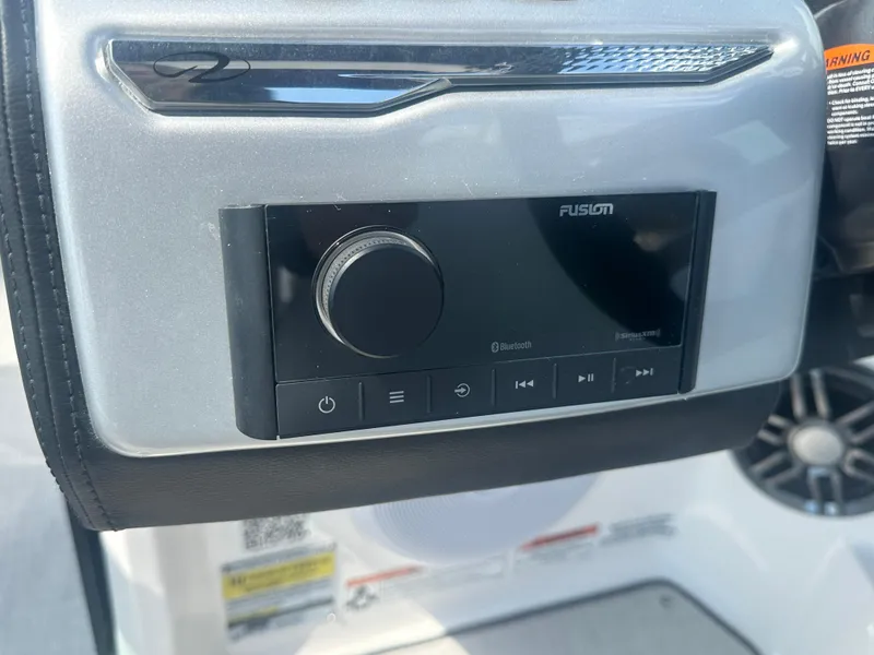 Slide: The Image of 2023 Regal 21 OBX boat audio system with Fusion stereo controls. - 38