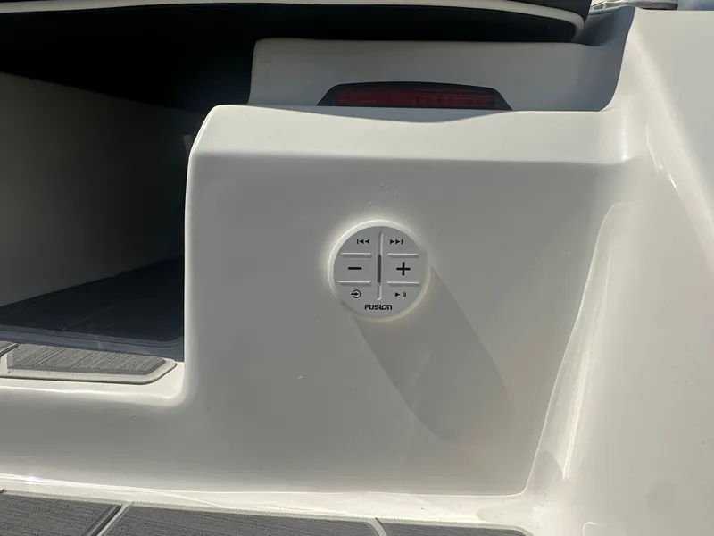 Slide: The Image of 2023 Regal 21 OBX boat with Fusion audio control panel on the deck. - 44