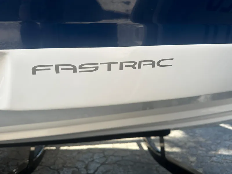 Slide: The Image of 2023 Regal 21 OBX boat with "FasTrac" logo on the hull. - 49