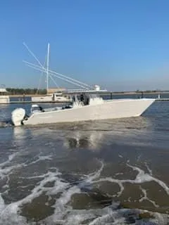Slide: The Image of 2020 Freeman 42 LR boat on water with clear blue sky background. - 15