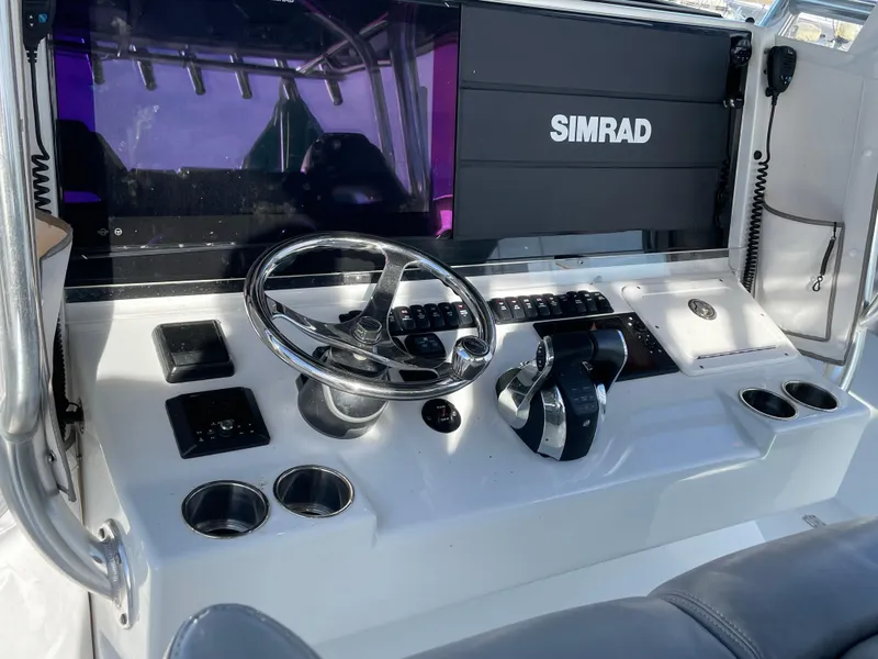 Slide: The Image of Control panel of a 2020 Freeman 42 LR boat with Simrad navigation system. - 34